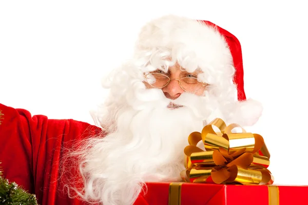 Santa Claus with present — Stock Photo, Image