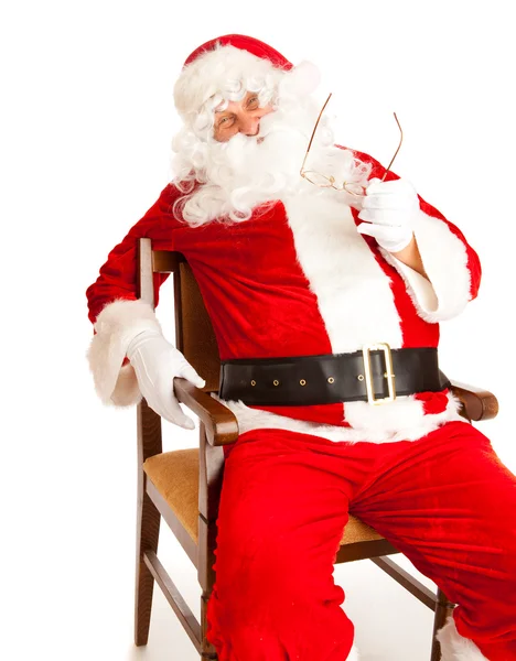 Santa in stoel — Stockfoto