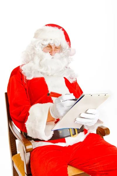 Papai Noel com lista de desejos — Fotografia de Stock