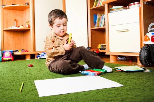 Boy with crayons — Stock Photo, Image