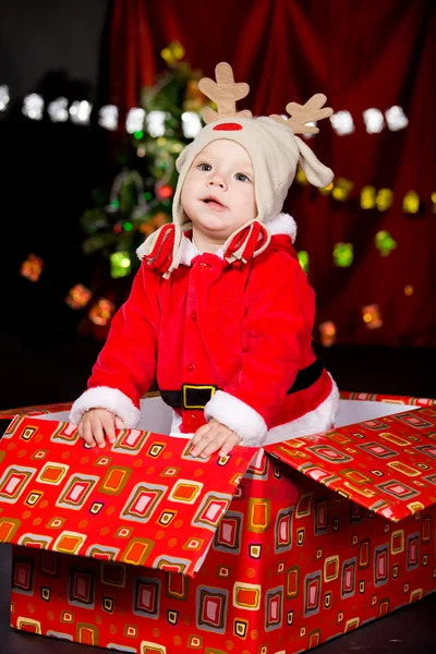 Dítě v santa kostým — Stock fotografie