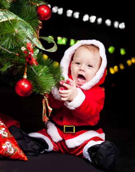 Giggling Santa baby — Stock Photo, Image