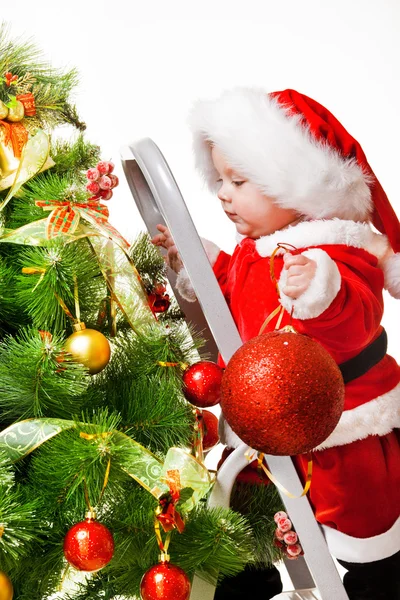 Kleinkind mit Weihnachtskugel — Stockfoto