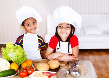 Cute african american little cooks clipart