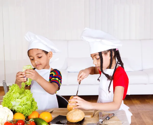 Siblings making sandwich — Stock Photo, Image