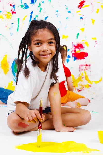 Junior student painting — Stock Photo, Image