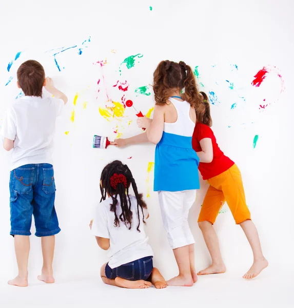 Kids painting wall — Stok fotoğraf