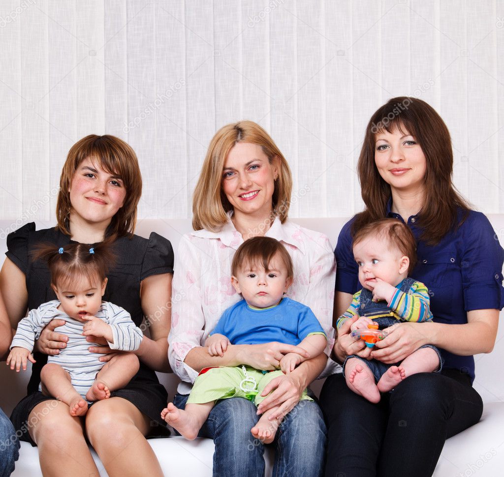 Women sitting with babies — Stock Photo © anatols #8687890