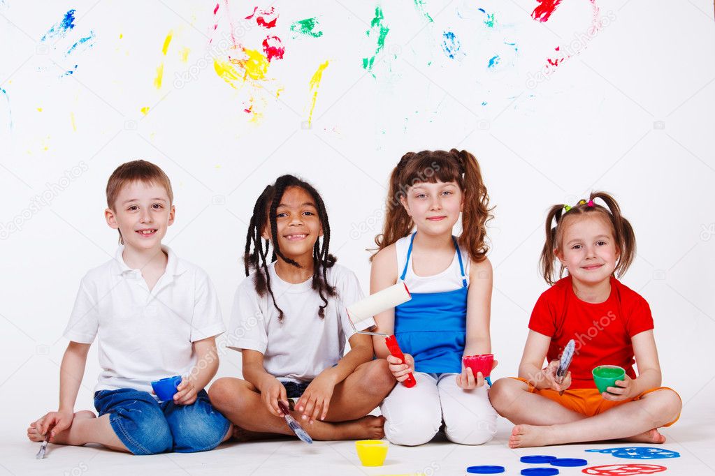 Children with paintbrushes
