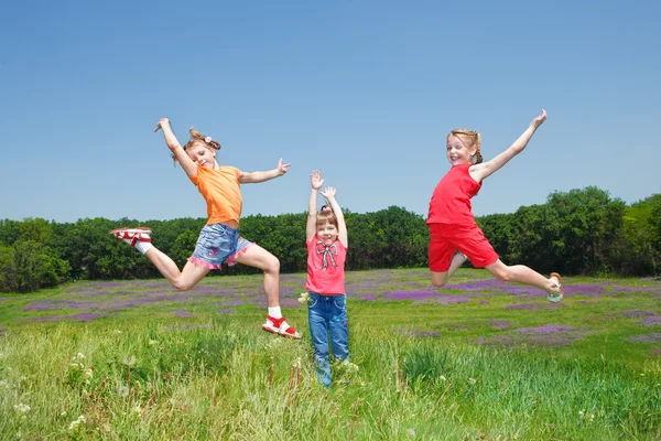 Girls jumping — Stock Photo, Image
