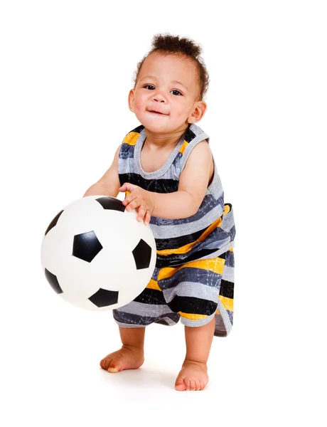 Мяч в руках ребенка — стоковое фото