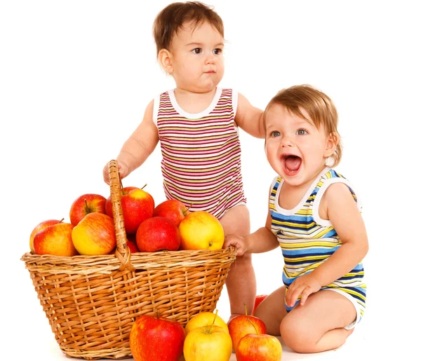 Toddlers with fruit basket — Stock Photo, Image
