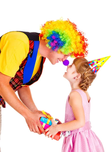 Clown giving present — Stock Photo, Image