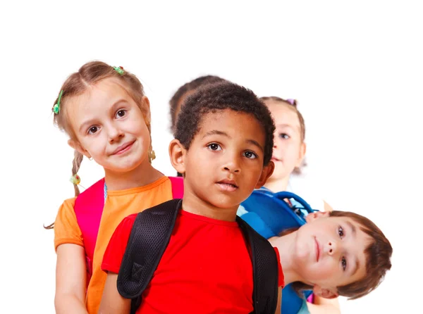 Niños con mochilas — Foto de Stock