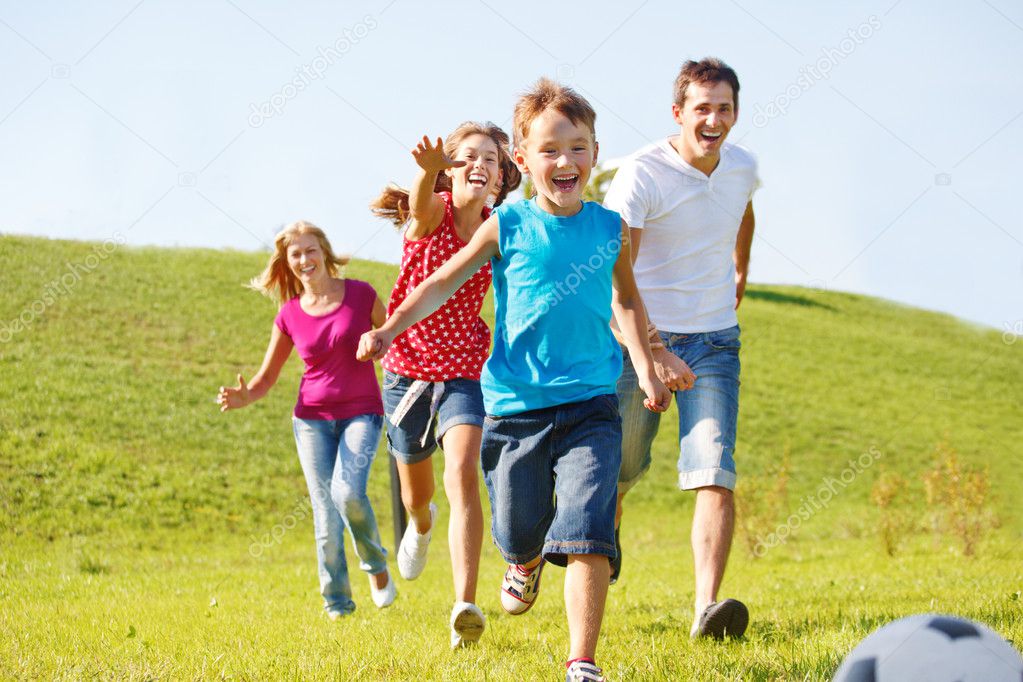 Happy family running
