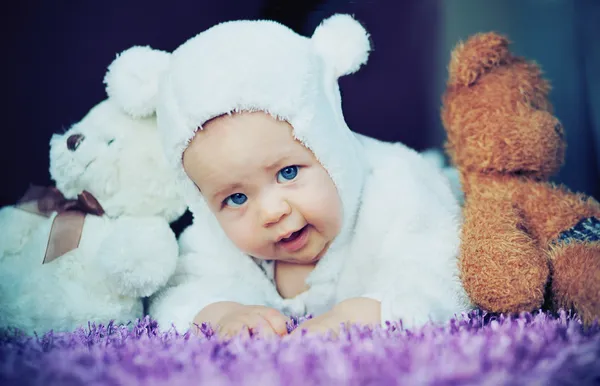 Cute baby with bears — Stock Photo, Image