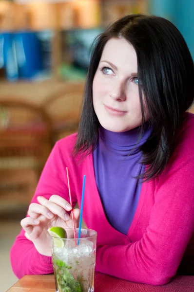 stock image Young woman having a mojito