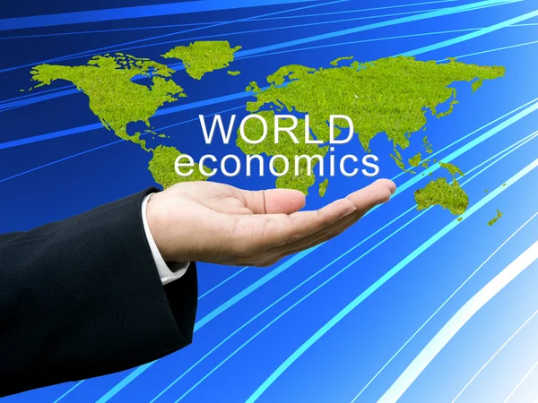 Världens ekonomi på businessman's hand — Stockfoto