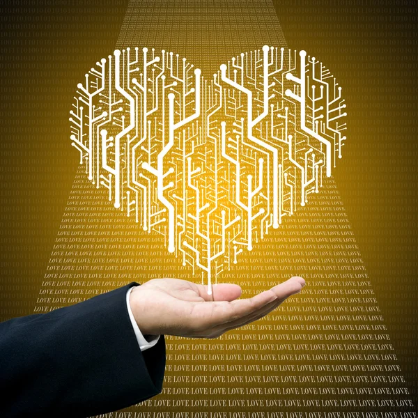Businessman care the circuit board in heart shape — Stock Photo, Image
