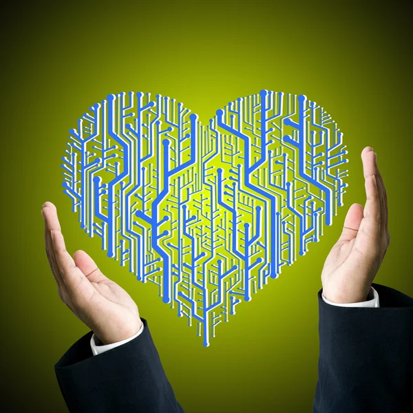 Üzletember védelme az áramköri lapot a szív alakú — Stock Fotó