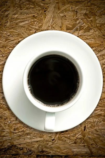 Kaffekopp på grunge bord av trä — Stockfoto
