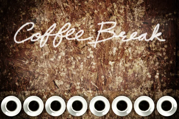 Šálek kávy na dřevěný stůl grunge — Stock fotografie