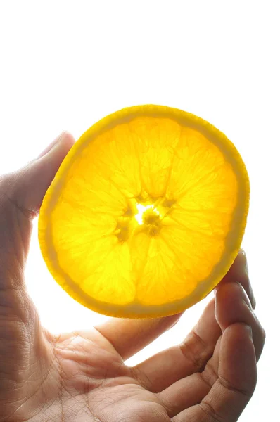 Dilimlenmiş portakal up pick — Stok fotoğraf