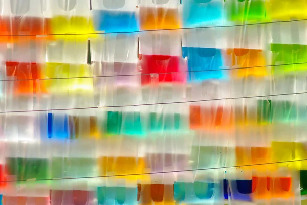 Agua colorida con bolsa de plástico — Foto de Stock