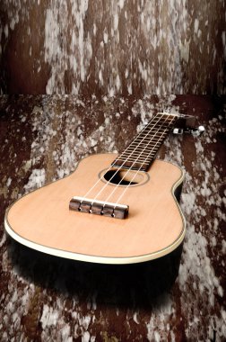 Ukulele grunge zemin üzerine
