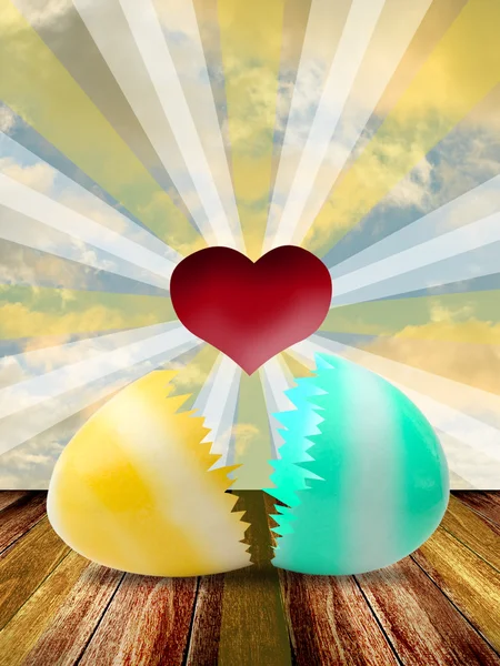 Красное сердце внутри пасхального яйца с ярким светом — стоковое фото