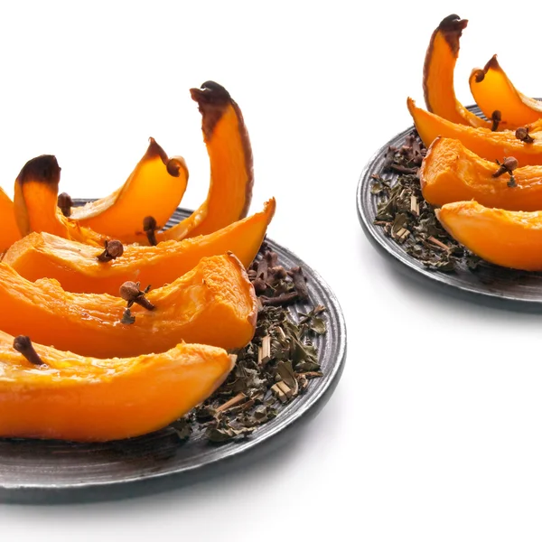 The roasted pumpkin with spice on a plate — Stock Photo, Image