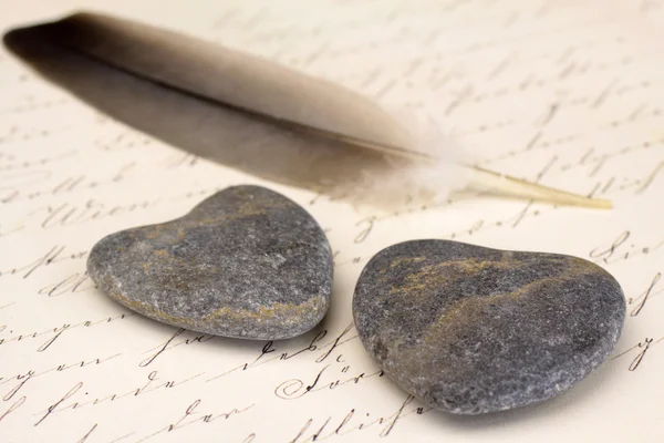 Stone hearts with letter — Stock Photo, Image