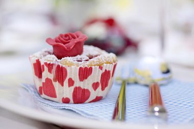 Muffin with marchpane rose clipart