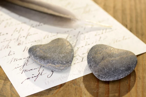 Stone hearts with letter — Stock Photo, Image