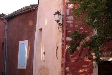 Colorful houses in Roussillon clipart