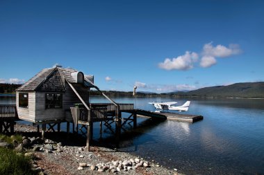 Flying boat on the Lake Te Anau clipart