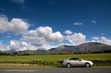 Car at country road clipart