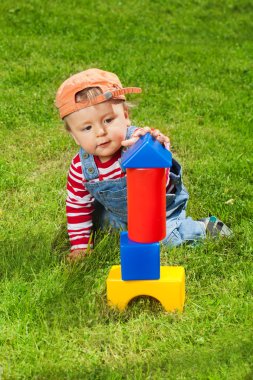 Toddler playing with blocks clipart