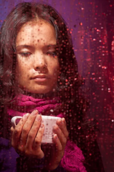 stock image Thoughtful Asian woman in rainy weather