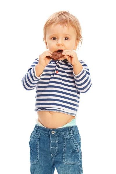 Симпатичный ребенок с шоколадом — стоковое фото