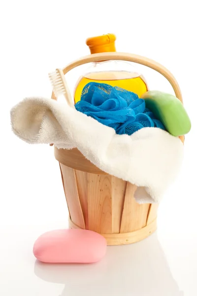 Bucket with towel, soap, showering gel and mop — Stock Photo, Image