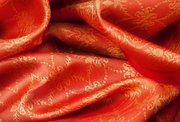 Folded fabric with ornament — Stock Photo, Image