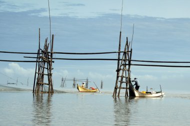 Fishermen in Bako clipart