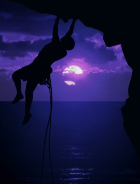 Rock climbing at night clipart