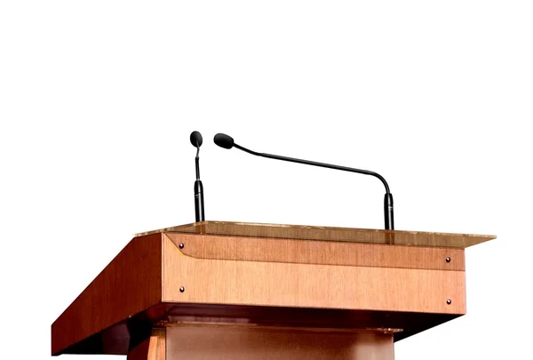 Podium seminarium i mikrofony na biały — Zdjęcie stockowe