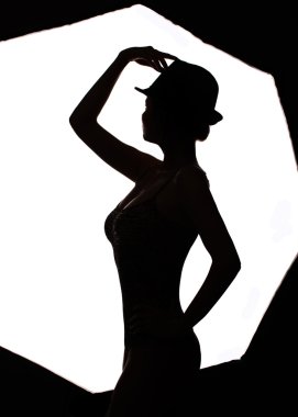 Stylish silhouette beautiful woman dancing