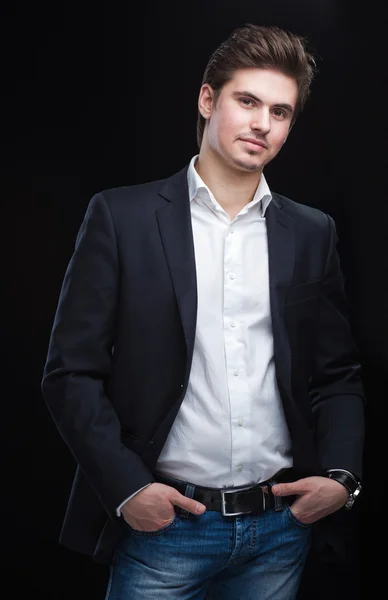Fashion young businessman black suit — Stock Photo, Image