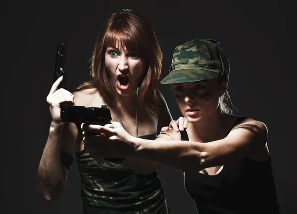 Sexy women holding gun — Stock Photo, Image