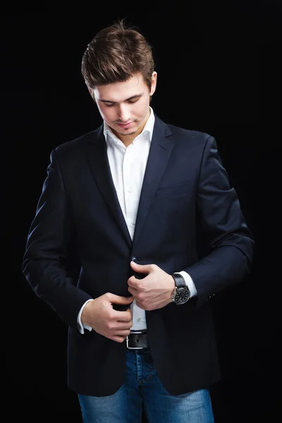 Fashion young businessman black suit — Stock Photo, Image