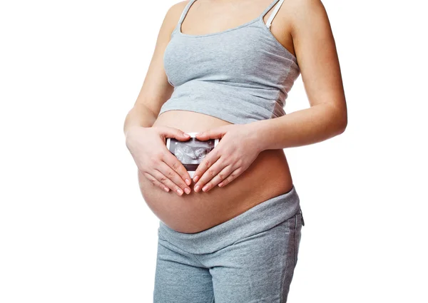 Mulher grávida com imagem ultra-sonográfica — Fotografia de Stock